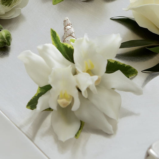 White Mini Cymbidium Boutonniere –  Loose Leaf Florist, Austin TX
